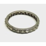 Unmarked precious metal all small Brilliant Cut Diamond set eternity ring