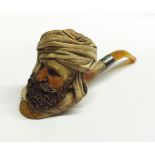 A large Victorian Carved Meerschaum Pipe of an Arab’s head with amber mouthpiece, 7” long, (the case
