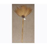 An unusual Ethnic Fly Wisp of large proportions, on a decorated wooden handle, 40” long