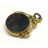 A Victorian Gold-plated swivel Fob with Bloodstone and Cornelian panel