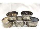 A group of five assorted hallmarked Silver Napkin Rings, conditions vary, total weight approximately