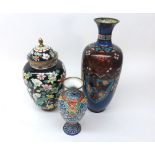 A collection of three Cloisonné/Enamel Vases including one covered Vase and two others, the large