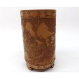 A carved Chinese Bamboo Brush Pot of cylindrical form, decorated with Chinese river scene with