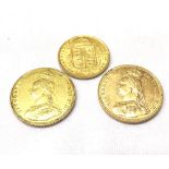 Group comprising two Victorian Gold Sovereigns both dated 1887 and a Victorian Gold Shield-front