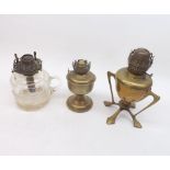 A Mixed Lot comprising: two late 19th or early 20th Century Brass Based Oil Lamp and a further Glass