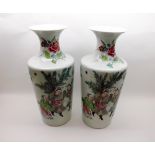 A pair of Chinese Large Baluster Vases with Flared Rim, painted in colours with scenes of warriors