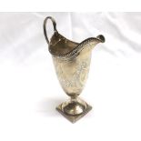 A George III Silver Helmet Cream Jug with bright cut garland decoration, beaded rim, beaded looped