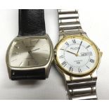 A Mixed Lot comprising: two various late 20th Century Quartz Wristwatches, Bulova “Longchamp”, the