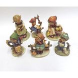 A collection of five Hummel Figures: Apple Tree Girl, Chick Girl, Apple Tree Boy (chipped), Just