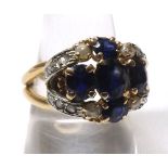 Unmarked precious metal designer-type Dress Ring with pierced shoulders, crown setting featuring