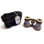 A pair of good quality French Opera Glasses with mother-of-pearl surrounds to the eye-pieces,