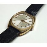 Gent’s Caravell Gold plated 17 jewelled wristwatch with calendar movement, black leather strap,