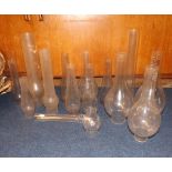 A Large Mixed Lot containing a range of Clear Glass Oil Lamp Chimneys in a range of sizes and