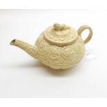 An early 19th Century Wedgwood Queens Ware Fruit and Fern pattern cream ground Teapot, the