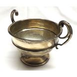 A George V Two-Handled Sugar Bowl of circular pedestal form, with raised body band, swept handles,