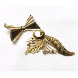 A Mixed Lot comprising: a small hallmarked 9ct Gold Bow Brooch, 31mm wide; and a Foreign high
