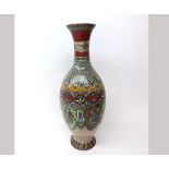 A Cloisonné baluster Vase decorated in colours with geometric designs and foliage, on an iron red