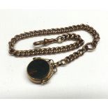 A late Victorian Gold curb link Albert with swivel Bloodstone Fob and Snap, 23cms long, weighing