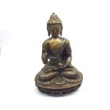 Chinese or Tibetan Bronze figure of a seated Buddha wearing ceremonial head-dress and with small