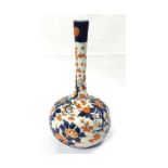 Imari Balustered Spill Vase, decorated in the traditional manner, in typical colours with all-over