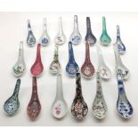 Mixed lot: various late 20th Century Rice Spoons, decorated in various colours and designs