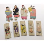 Collection of nine various Oriental fabric embroidered, cardboard backed, cut-out figures,