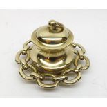 Unusual Brass Inkwell, of round form, fitted with hinged lid, the body decorated with chain link