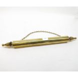 An unusual 19th Century Brass Rolling Pin, of typical form, tapering handles and wall hanging chain,