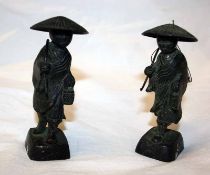 A pair of small Chinese Bronze Patinated Figures of workmen wearing coolie hats, both 4 high