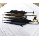 A collection of assorted Umbrellas, mostly mid-20th Century