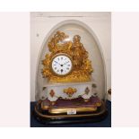 Late 19th Century gilt Spelter and alabaster Mantel Timepiece, the figural case with drum body