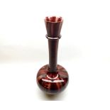 A large Red Glazed Onion Formed Vase, with a streaked type finish, no makers marks apparent, 16