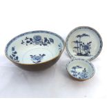 A Nankin Slop Bowl and Tea Bowl and Saucer, each typically decorated in underglaze blue with