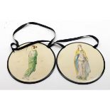 A pair of painted Bakelite Plaques of classical decorated young ladies, bearing signature