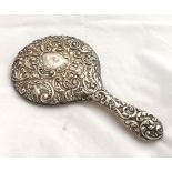 Edward VII Silver backed dressing table Hand Mirror, the body with extensive embossed detail, 11