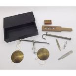 A Cased Travelling Set of Miniature Beam Scales, with accompanying graduated set of miniature