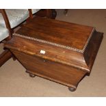 19th Century Mahogany sarcophagus formed Cellaret Box, the hinged lid opening to reveal a sub-