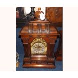 Early 20th Century Oak and Walnut Mantel Clock, Junghans, the architectural case with overhanging