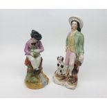 A Mixed Lot comprising: two 19th Century Staffordshire Figures, one modelled as a seated huntsman