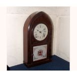 Early 20th Century American Walnut Mantel Clock, the lancet shaped case to a glazed door with