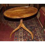 Small 19th Century oval Mahogany Occasional Table raised on turned column and tripod base, top is 21