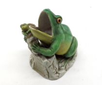 Unusual European Match Striker modelled as a seated frog, and a froglet resting against a striker