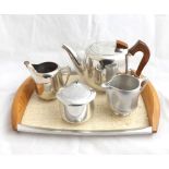 A mid-20th Century Picquot Ware Polished Aluminium Four-Piece Tea Set with matching Tray (5)
