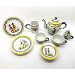 A mixed lot: various Henriot Quimper table wares comprising teapot (A/F), cream jug, tankard, two