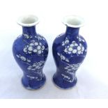 A near pair of Chinese Balustered Spill Vases, decorated in underglaze blue with prunus blossom