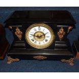 Early 20th Century black painted and bronzed cast metal American Mantel Clock, Ansonia Clock Co, the