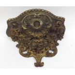 19th Century giltwood Wall Bracket, elaborately decorated with raised foliage and shell detail, some