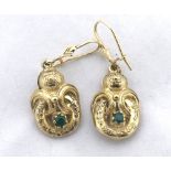 A pair of Victorian style yellow metal scroll design Drop Earrings, each set with a single small