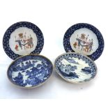 Two Chinese Export Circular Saucers, typically decorated in underglaze blue with Chinese river