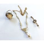 A Mixed Lot including: an Edwardian yellow metal Bar Brooch, set to the centre with a Seed Pearl